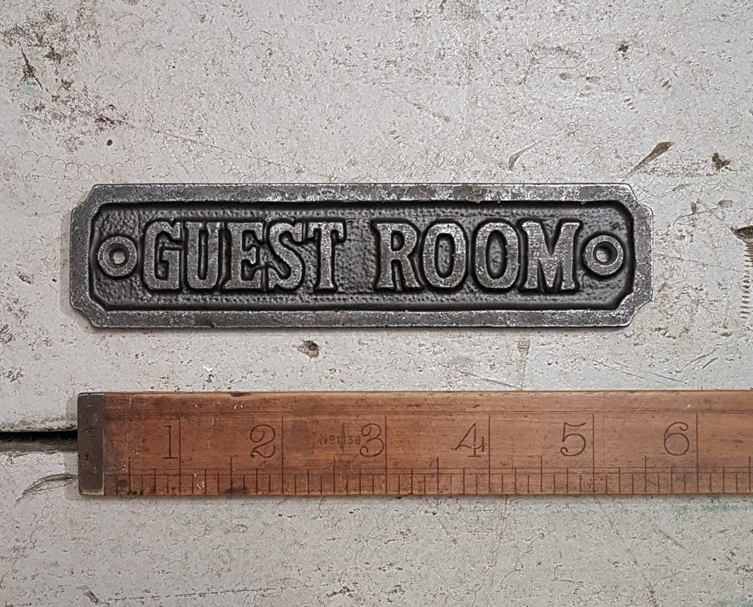 Antique Iron Plaque Guest Room