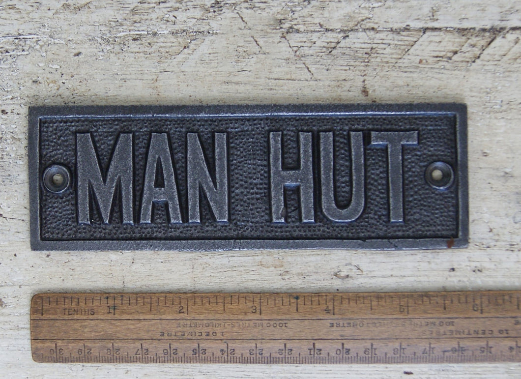 Cast iron plaque Man Hut